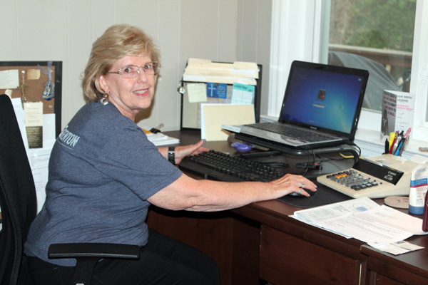 Bennie at her desk