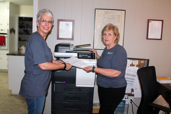 Debbie and Bennie hard at work for you.